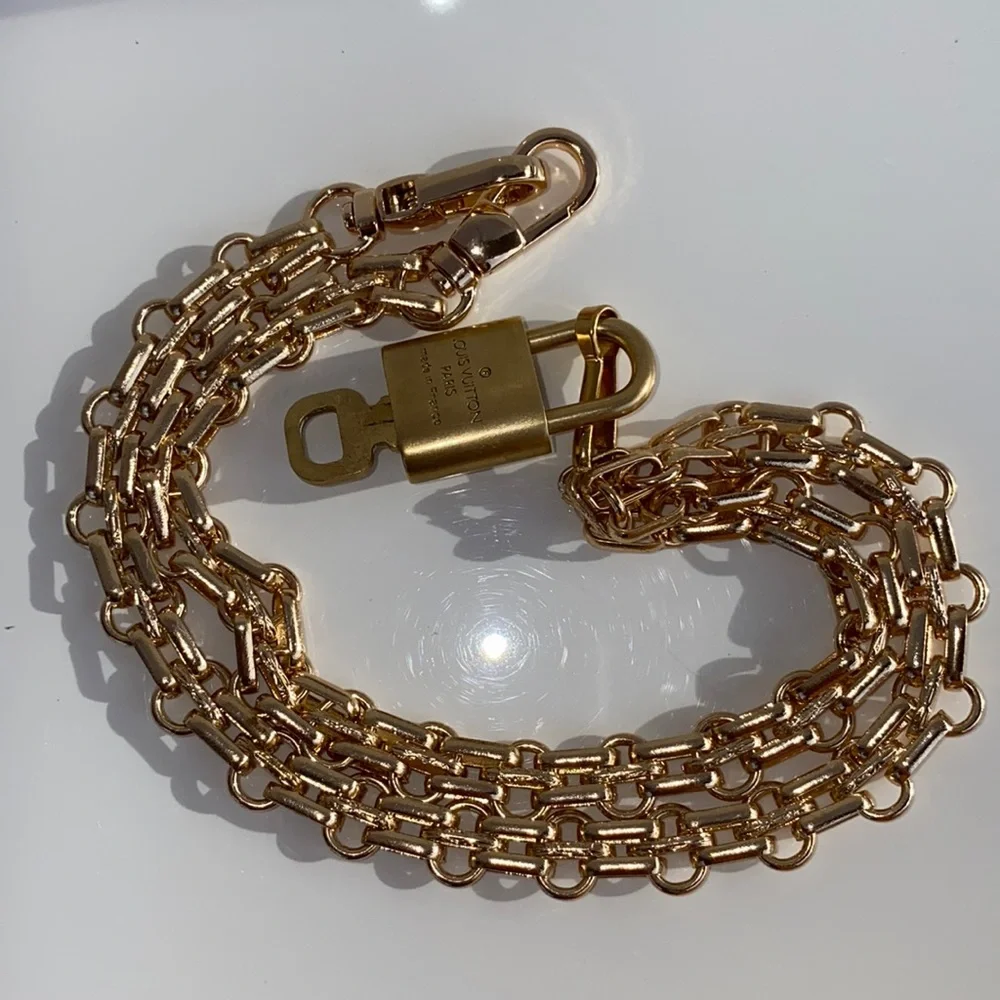 Authentic Louis Vuitton Lock and Key Set on a Chain. - Picture 6 of 10